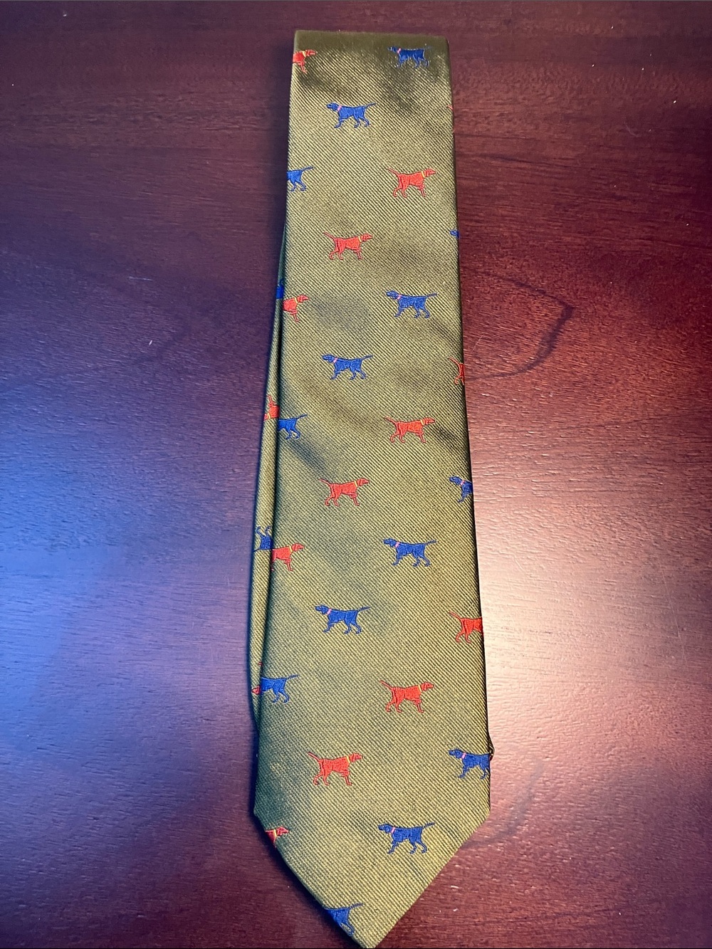 Holland & Holland Olive Men’s silk Tie with Red & Blue Dog Motif made in England